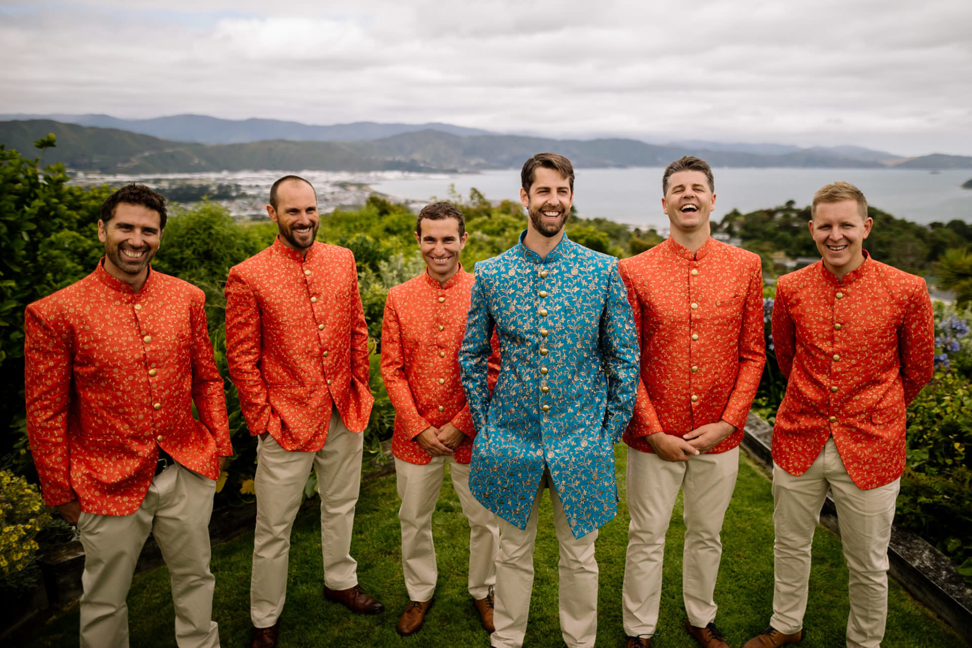 Western Indian fusion wedding day with groom and groomsmen in traditional Sherwani 