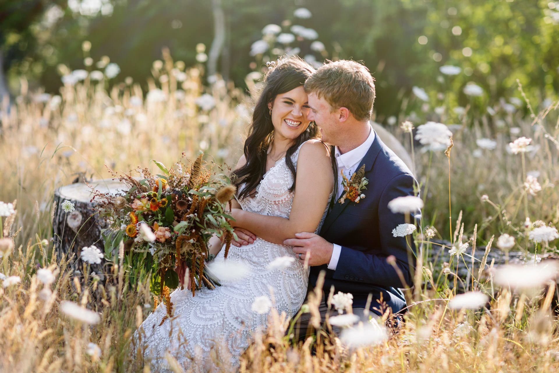 bride and groom flower field wedding photograph