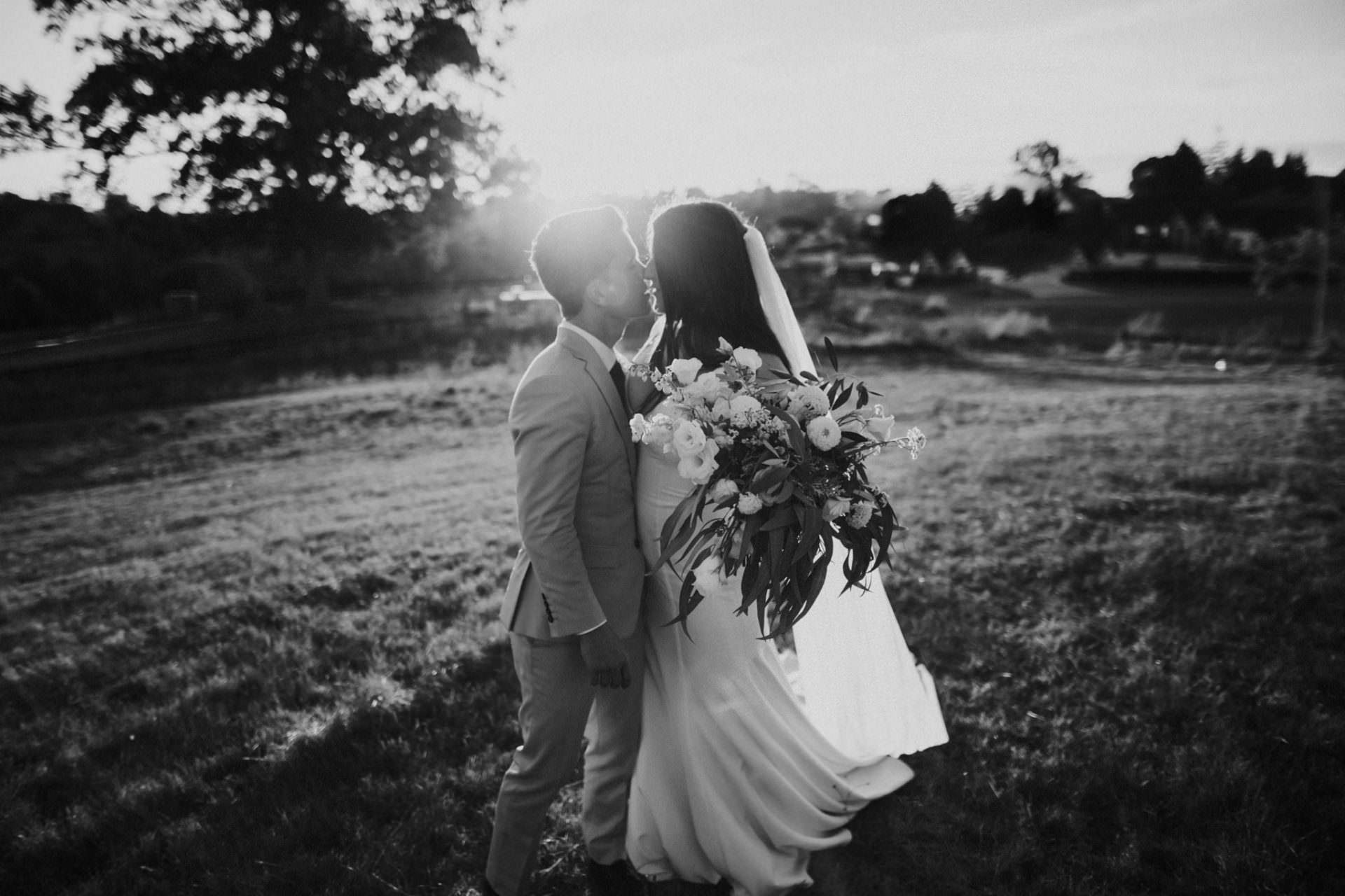 Black and white sunset wedding photograph